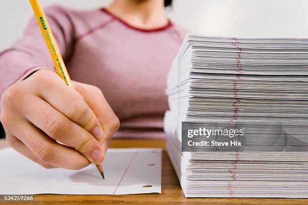 Student Using Notebook Paper High School Notebook Paper Photos and Premium High Res Pictures - Getty ...