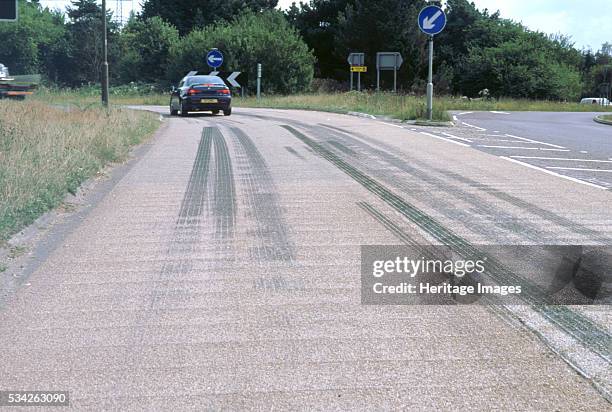 Tyre skid marks on road surface, 2000.