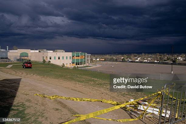 Dark storm clouds gather over Columbine High School just one month after the tragic shootings. In May of 1999, students Eric Harris and Dylan Klebold...