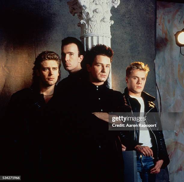 Adam Clayton , The Edge , Bono and Larry Mullen, Jr. Form the rock band U2.