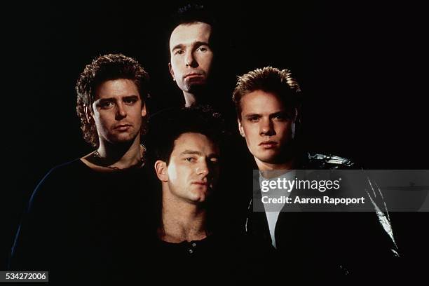 Adam Clayton , The Edge , Bono and Larry Mullen, Jr. Form the rock band U2.
