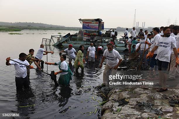 Residents of east Delhi along with BJP workers and Yuva BJP members participate in cleaning the Yamuna River as a part of the Swachh Bharat Abhiyan...