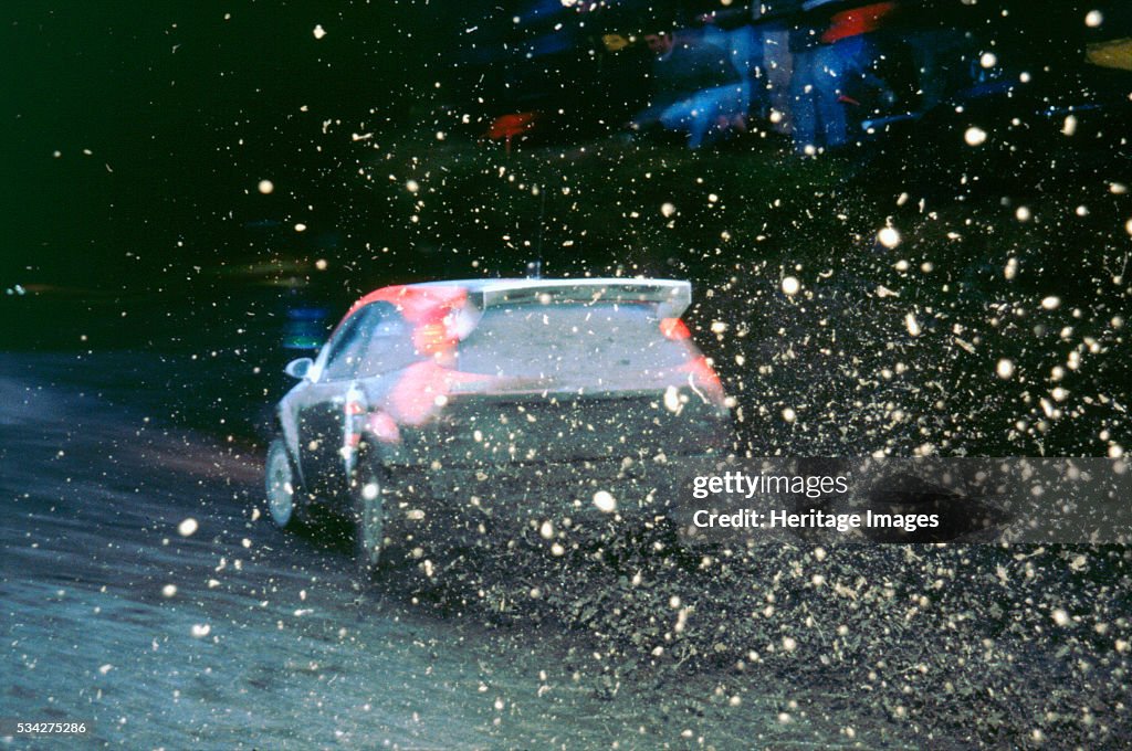1999 Ford Focus WRC C.McRae. Network Q Rally with flying mud!