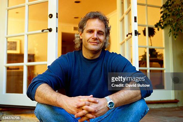 Chris Carter, producer of the television show The X Files, sits outside a home in Los Angeles.