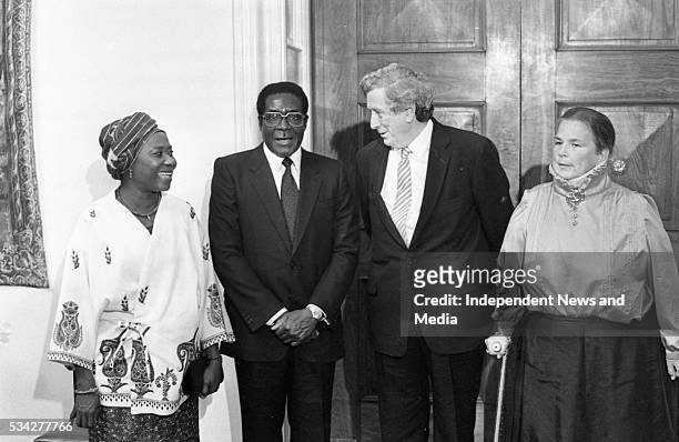 President of Zimbabwe Robert Mugabe, his wife Sally, former Taoiseach of Ireland Garrett Fitzgerald and his wife Joan at a State reception at Dublin...