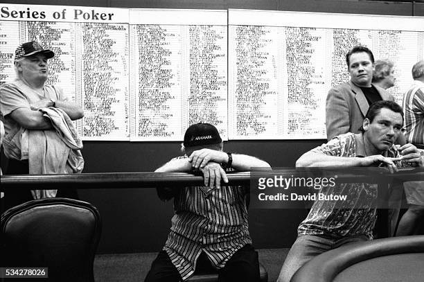 Participants at the annual World Series of poker tournament in downtown Las Vegas. --- Photo by David Butow/Corbis SABA