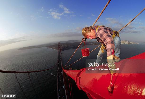 painting the golden gate bridge - the golden gate bridge stock pictures, royalty-free photos & images