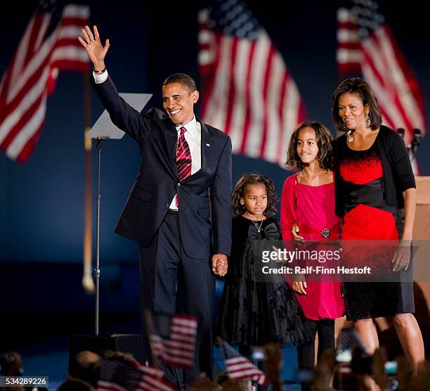 President elect Barack Obama, his daughter Sasha , his daughter Maila, 10 and his wife Michele on the stage of his election night victory party in...