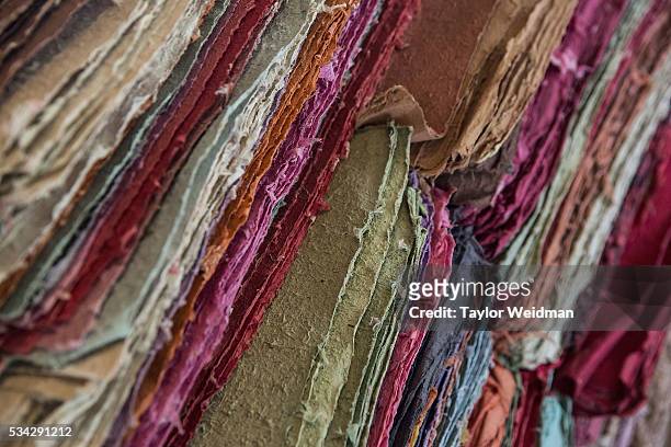 Sheets of elephant dung paper at Elephant "PooPooPaper" Park on May 24, 2016 in Mae Rim, Thailand. Elephant "PooPooPaper" Park is an eco-tourism...