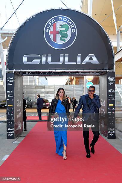 Melissa Satta and Kevin-Prince Boateng arrive at Bocelli and Zanetti Night on May 25, 2016 in Rho, Italy.