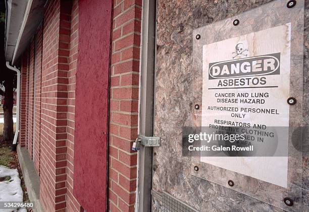 warning sign in love canal - asbestos stock pictures, royalty-free photos & images