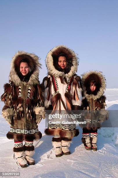 inuit children in winter furs - inuit stock pictures, royalty-free photos & images