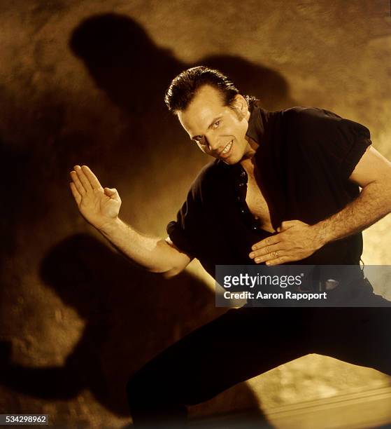 Bill Paxton in a karate pose