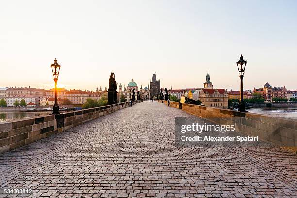 charles bridge in prague, czech republic - karlsbrücke stock-fotos und bilder