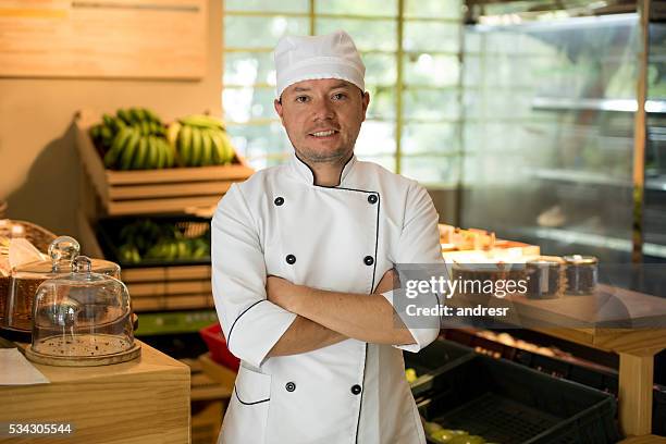 chef working at a food market - chef market stock pictures, royalty-free photos & images