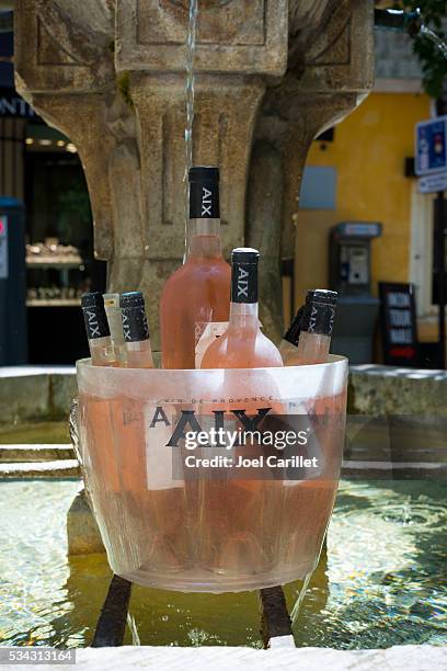 bottles of rose in aix-en-provence, france - blush wine stock pictures, royalty-free photos & images
