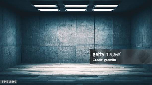 dark, spooky, empty office or basement room - interrogated stock pictures, royalty-free photos & images