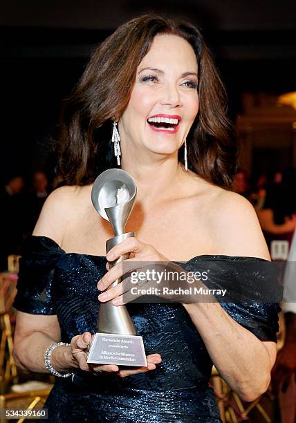 Honoree Lynda Carter poses with her Lifetime Achievement Award at the 41st Annual Gracie Awards at Regent Beverly Wilshire Hotel on May 24, 2016 in...