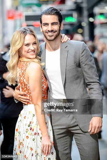 Professional dancer Peta Murgatroyd and model Nyle DiMarco leave the "Good Morning America" taping at the ABC Times Square Studios on May 25, 2017 in...