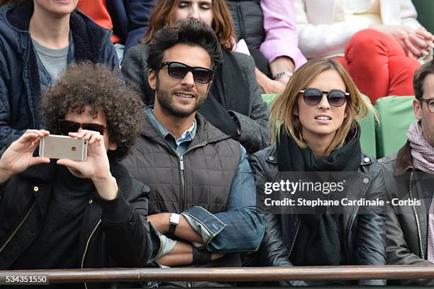 Maxime Nucci and Isabelle Ithurburu at Roland Garros on May 24, 2016 in Paris, France.