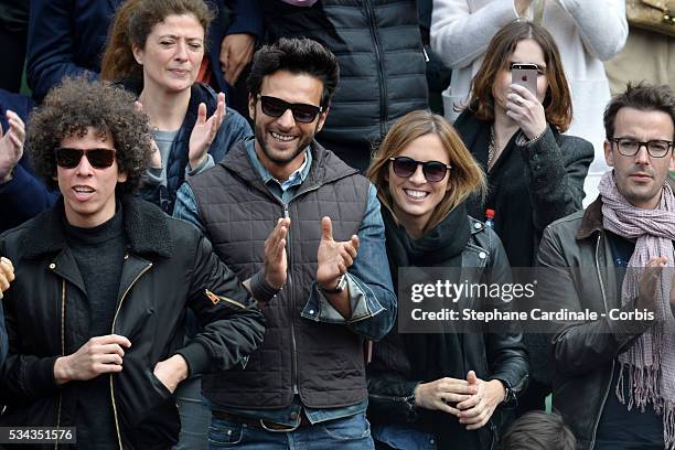 Maxime Nucci and Isabelle Ithurburu at Roland Garros on May 24, 2016 in Paris, France.