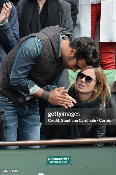 Maxime Nucci and Isabelle Ithurburu at Roland Garros on May 24, 2016 in Paris, France.