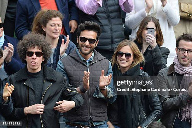 Maxime Nucci and Isabelle Ithurburu at Roland Garros on May 24, 2016 in Paris, France.