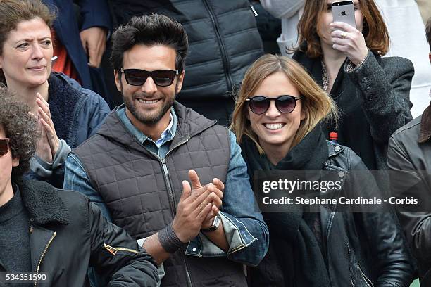 Maxime Nucci and Isabelle Ithurburu at Roland Garros on May 24, 2016 in Paris, France.