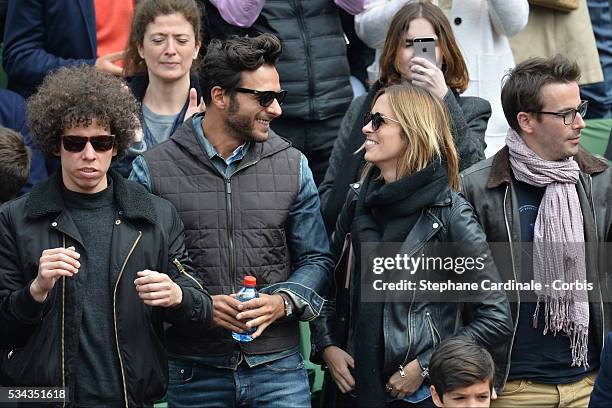 Maxime Nucci and Isabelle Ithurburu at Roland Garros on May 24, 2016 in Paris, France.