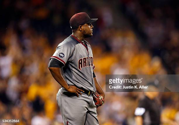 Rubby De La Rosa of the Arizona Diamondbacks reacts after giving up a two run home run in the fifth inning during the game against the Pittsburgh...