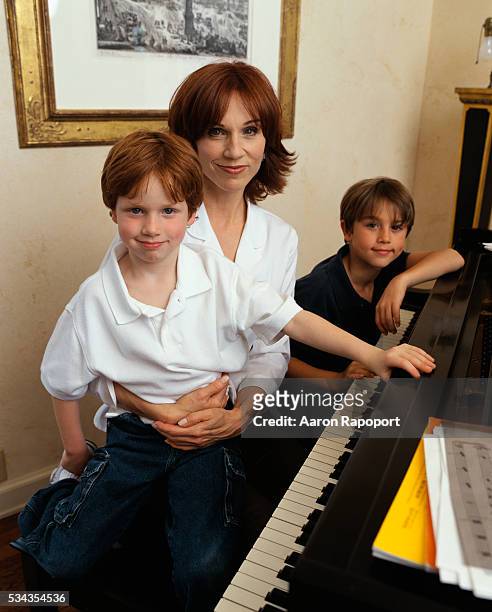 Marilu Henner sits with her sons, Joseph and Nicholas .