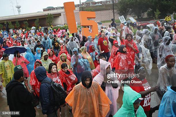 Demonstrators calling for an increase in the minimum wage to $15-dollars-per-hour march to McDonald's corporate headquarters during a protest on May...