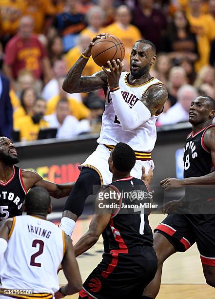 LeBron James of the Cleveland Cavaliers drives to the basket in the second quarter against the Toronto Raptors in game five of the Eastern Conference...