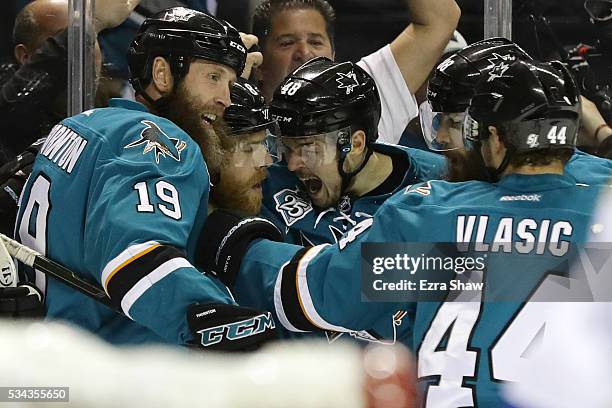 Joe Pavelski of the San Jose Sharks celebrates his goal against the St. Louis Blues with Joe Thornton, Brent Burns, Tomas Hertl and Marc-Edouard...