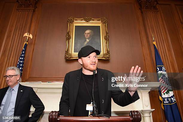 President Joe Lamond and Eric Paslay speak the CMA, NAMM, VH1 Congressional Reception for Music Education at the U.S. Capitol on May 25, 2016 in...