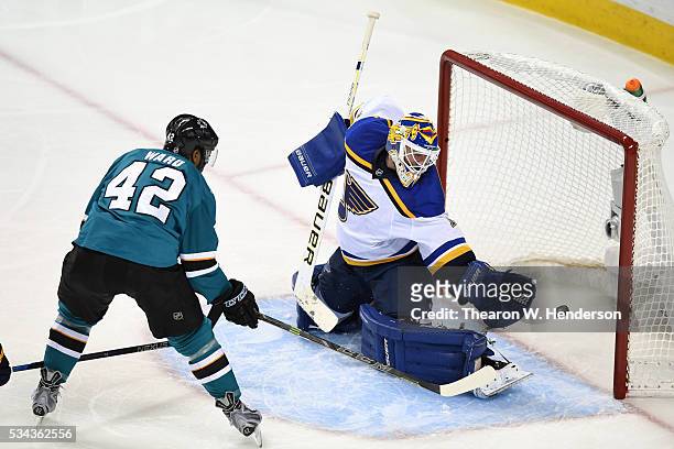 Joel Ward of the San Jose Sharks scores his second goal on Brian Elliott of the St. Louis Blues in Game Six of the Western Conference Final during...