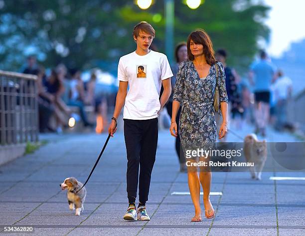 Helena Christensen and her son Mingus Reedus are seen out with their dog Kuma on May 25, 2016 in New York City.