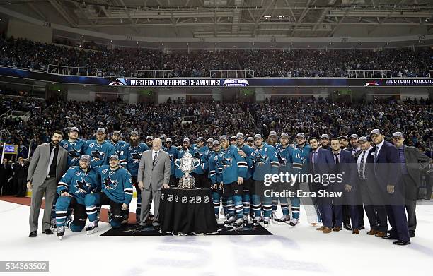 The San Jose Sharks pose with the Clarence S. Campbell Bowl after they were awarded the trophy by NHL Deputy Commissioner Bill Daly for beating the...