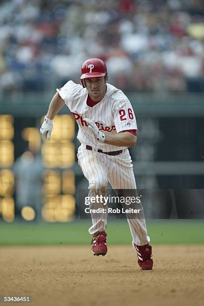 August 4: Chase Utley of the Philadelphia Phillies runs to third base during the game against the Chicago Cubs at Citizens Bank Park on August 4,...