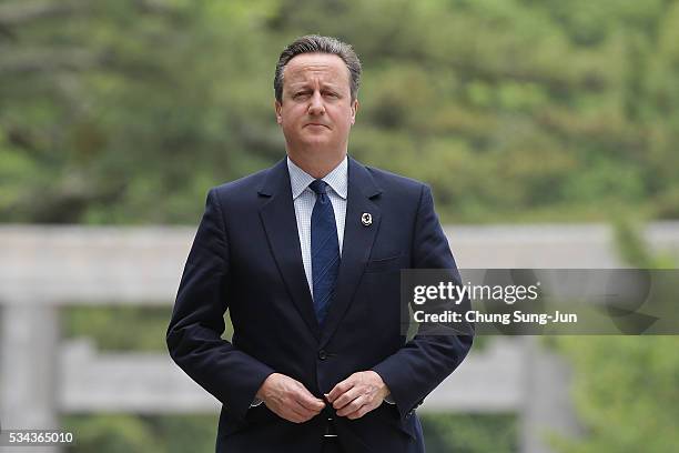 British Prime Minister David Cameron walks on the Ujibashi bridge as he visit at the Ise-Jingu Shrine on May 26, 2016 in Ise, Japan. In the two-day...