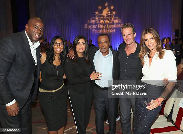 Magic Johnson, Earlitha Kelly, Bernadette Leonard, Sugar Ray Leonard, Rande Gerber and Cindy Crawford attend B. Riley & Co. And Sugar Ray Leonard...