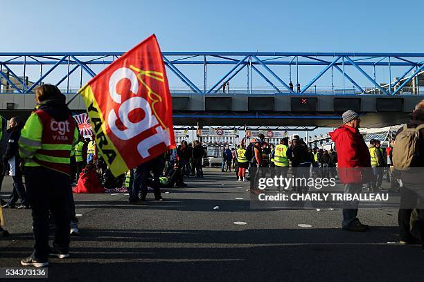 Unionists block the tollgate of the "Pont de Normandie", in Le Havre northwestern France, on May 26 to protest against the government's proposed lab...