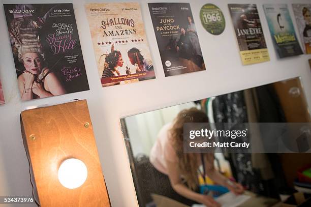 Posters for previous theatre productions are displayed in the wardrobe room backstage at the Bristol Old Vic theatre, on May 24, 2016 in Bristol,...