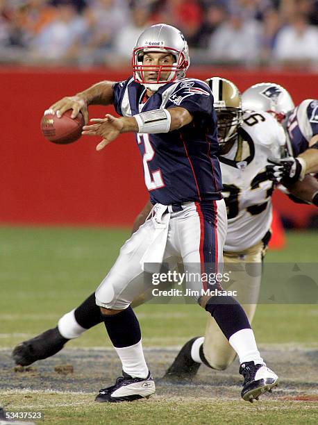 Quarterback Doug Flutie of the New England Patriots looks to pass against the New Orleans Saints at Gillette Stadium on August 18, 2005 in Foxboro,...