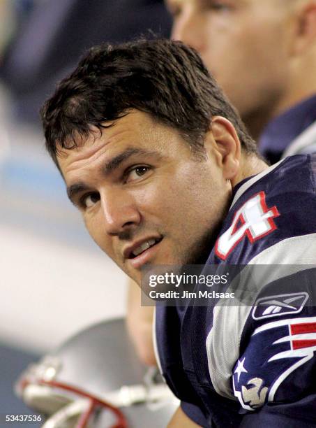 Kicker Adam Vinatieri of the New England Patriots looks on from the bench during the preseason NFL game against the New Orleans Saints at Gillette...