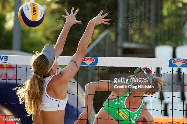 Evgenia Ukolova of Russia blocks an attack of Nicole Laird of Australia during 2nd day of the FIVB Moscow Grand Slam on May 25, 2016 in Moscow,...