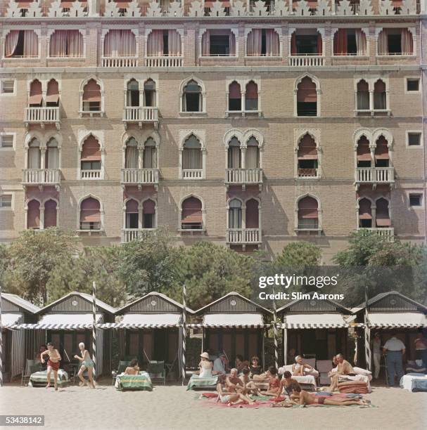 The beach front of the luxurious Hotel Excelsior on the Venice Lido, Italy, 1957.