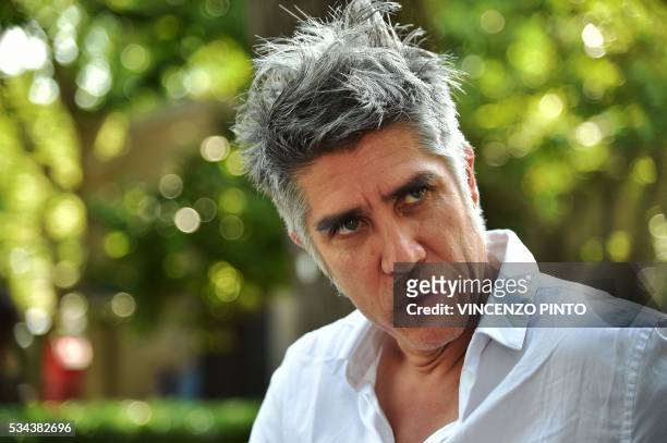 Chilean architect, Alejandro Aravena, speaks during an interview at the opening of the 15th International Architecture Exhibition in Venice on May...