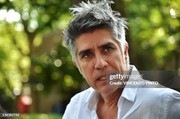 Chilean architect, Alejandro Aravena, speaks during an interview at the opening of the 15th International Architecture Exhibition in Venice on May...