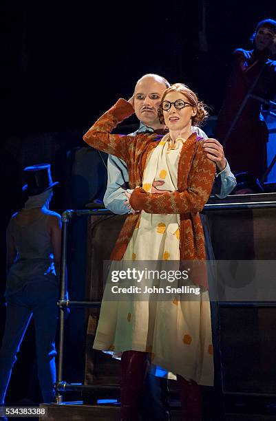 Rory Kinnear, as Macheath and Rosalie Craig, as Polly Peachum, perform on stage in a performance of The Threepenny Opera at The National Theatre on...